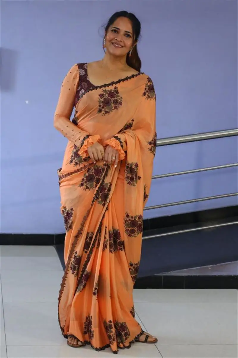 Telugu Actress Anasuya Bharadwaj In Beautiful Orange Saree